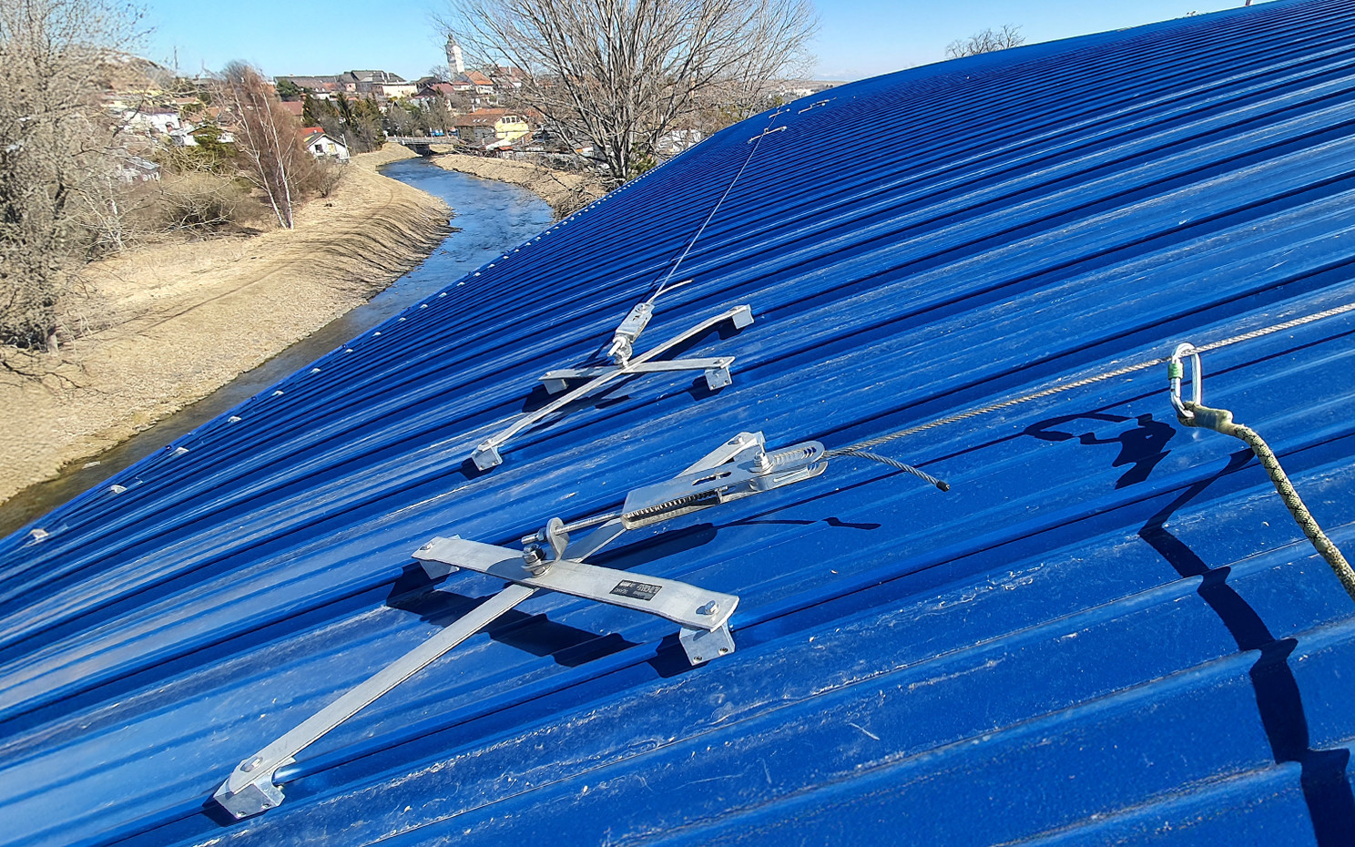 Standing seam metal roof with certified anchor points for fall protection